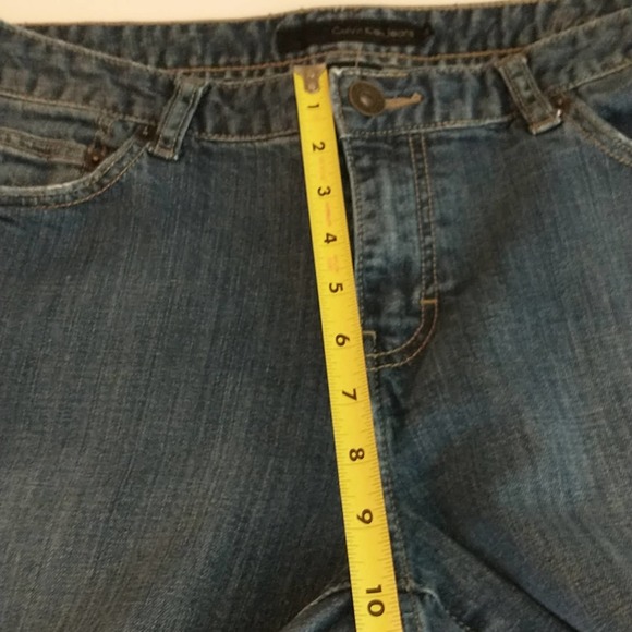 Calvin Klein medium wash mid-rise bootcut women's jeans. 12. - Picture 11 of 12